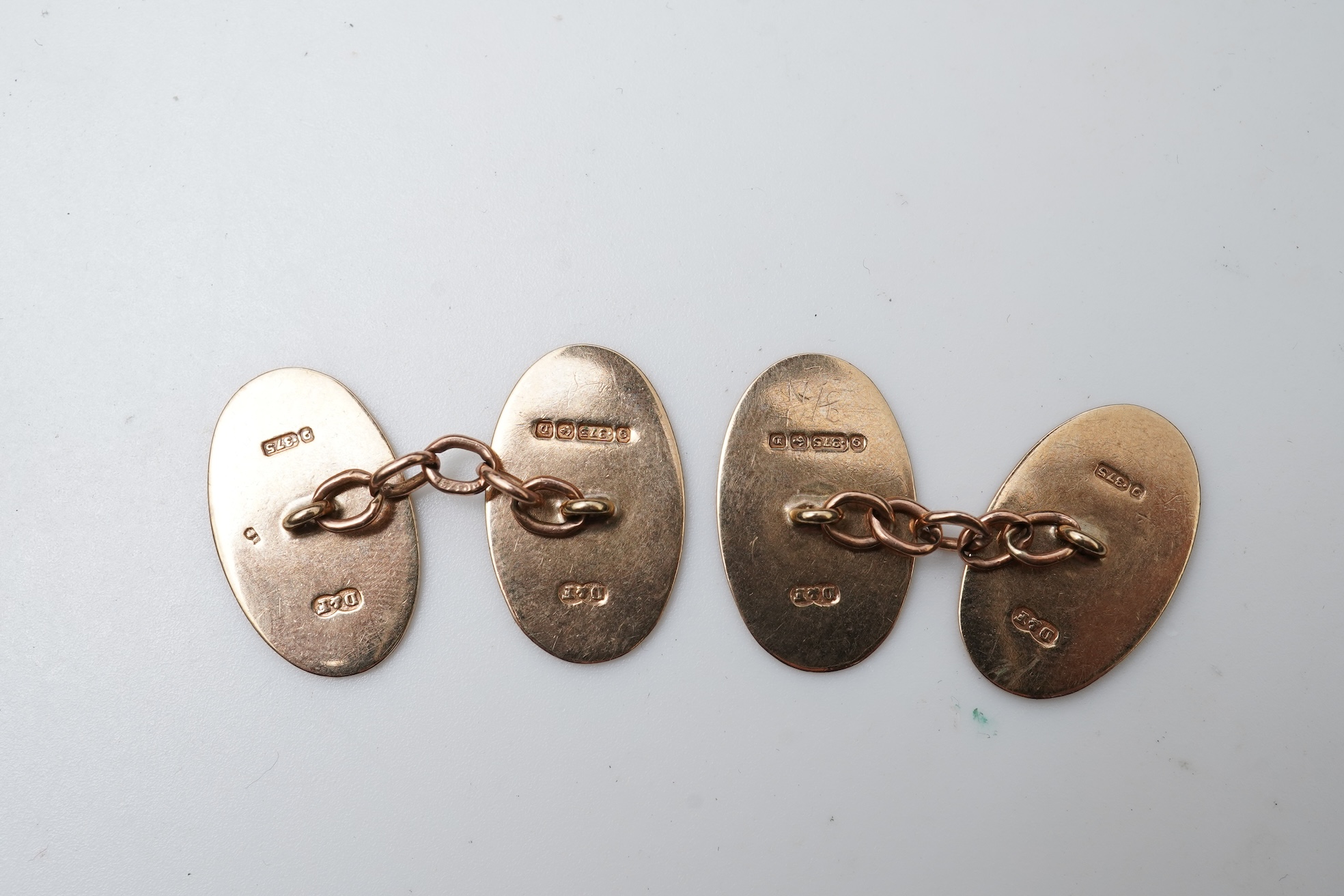 Two pairs of gold cufflinks